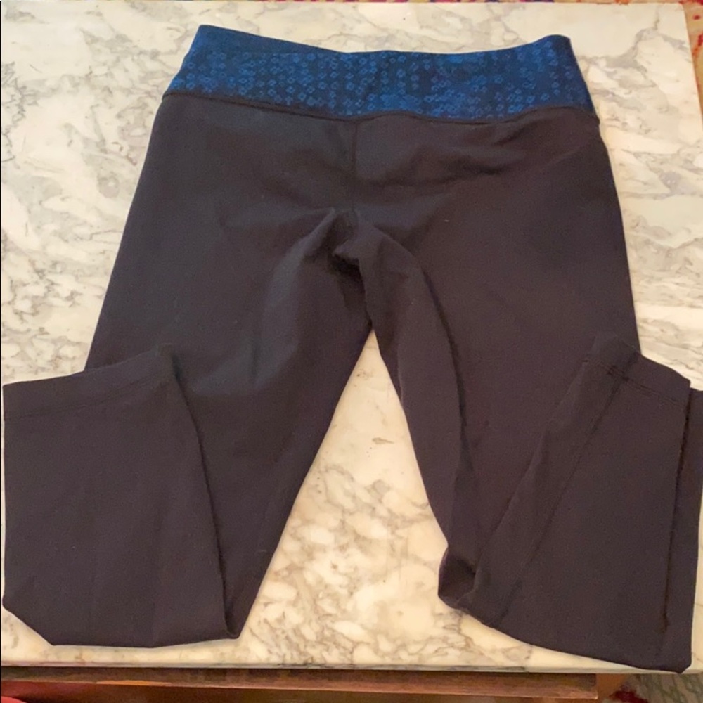 Lululemon crops, flower crossed waist band